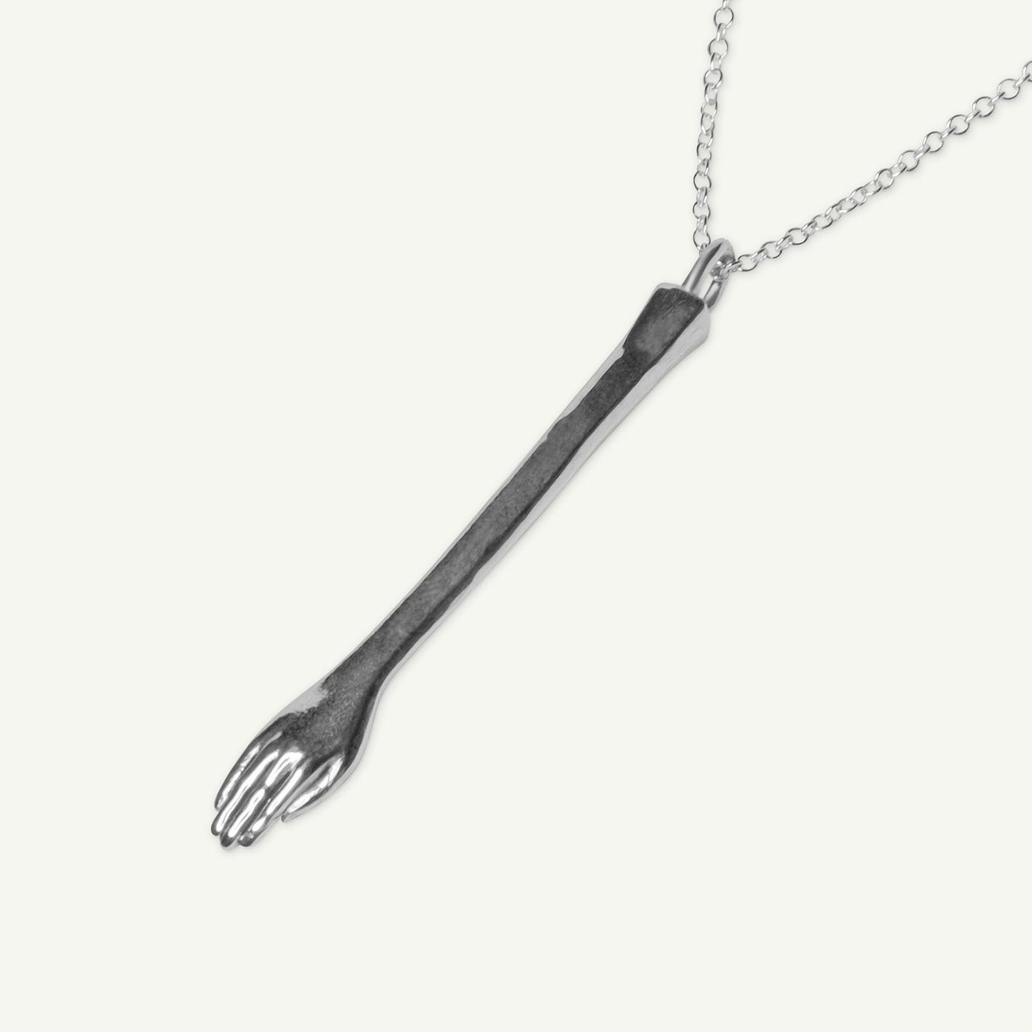 flat lay of The Anglesea Arm Silver – silver secret spoon stash necklace