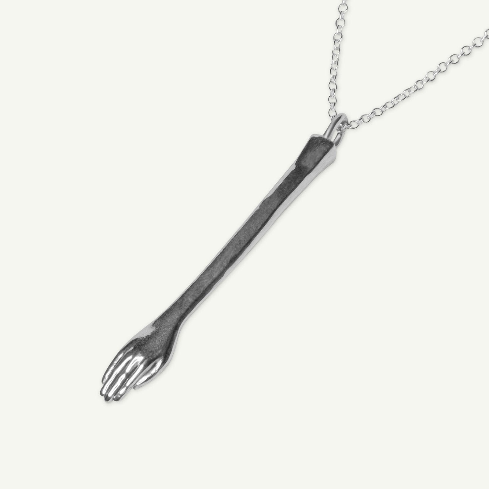 flat lay of The Anglesea Arm Silver – silver secret spoon stash necklace