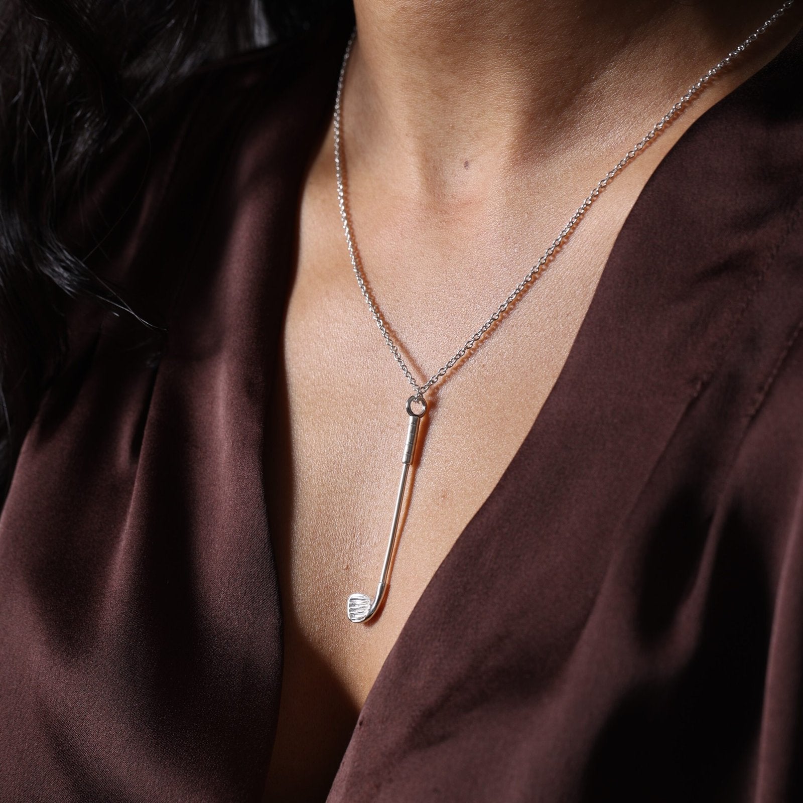 half profile of Who's Your Caddy Silver – secret spoon locket necklace