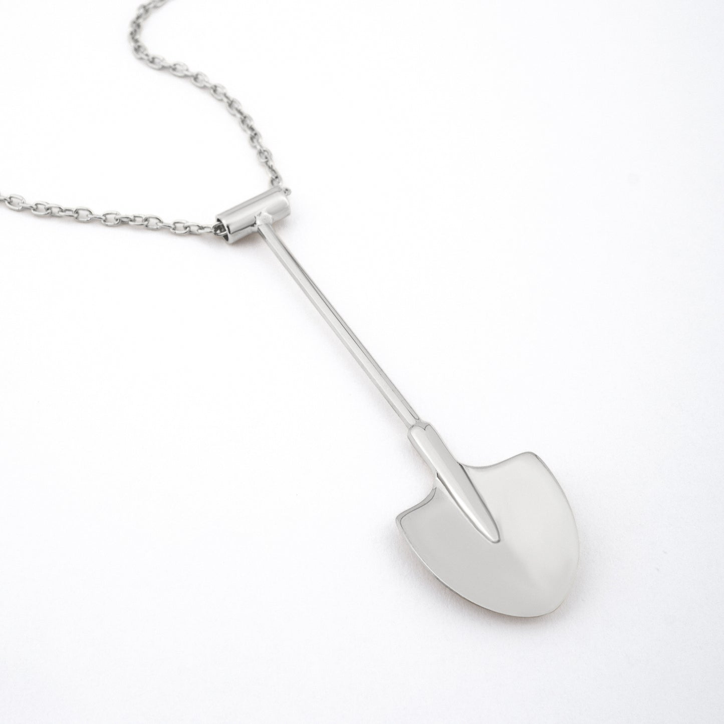 side profile – silver shovel pendant necklace, Spade In Chelsea
