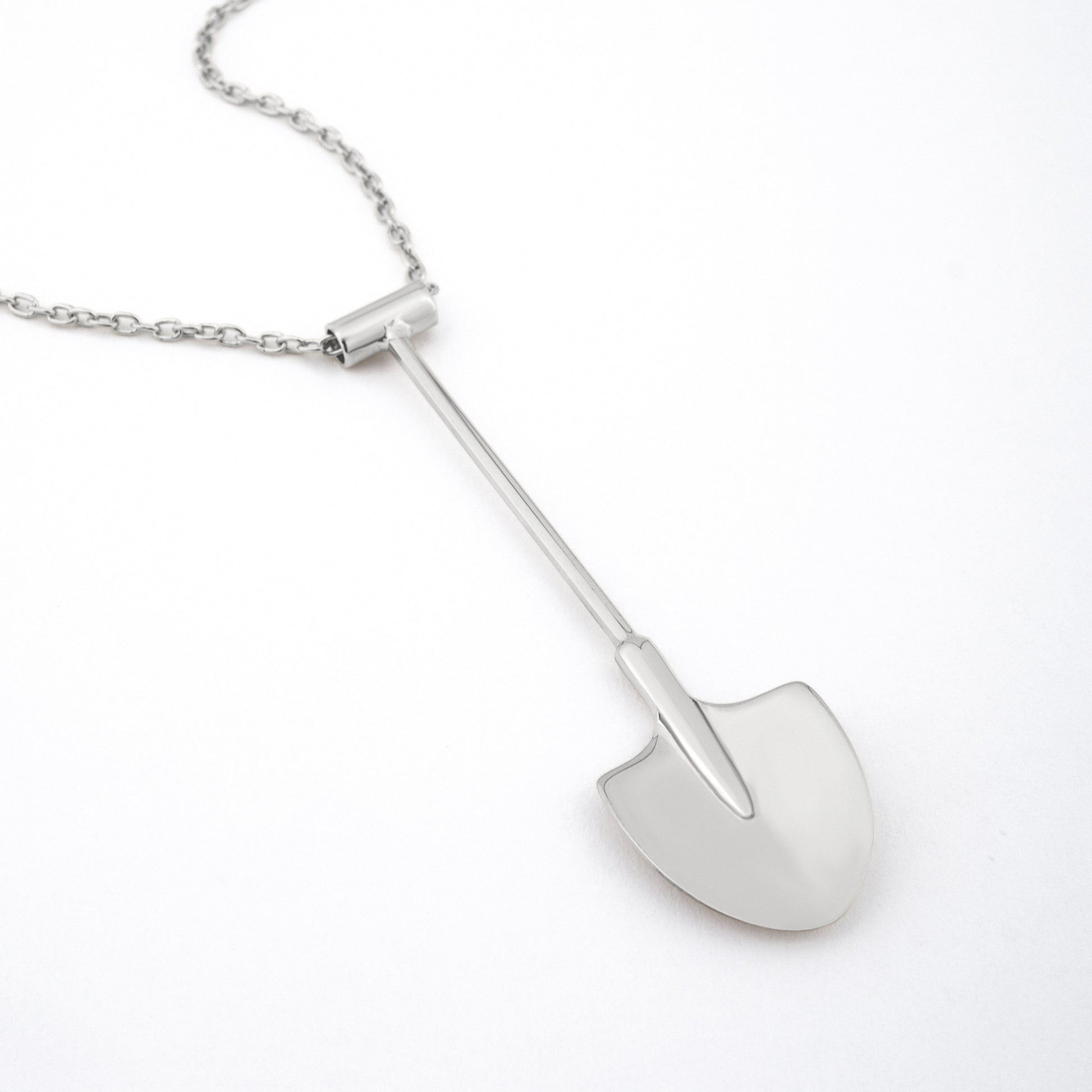 side profile – silver shovel pendant necklace, Spade In Chelsea
