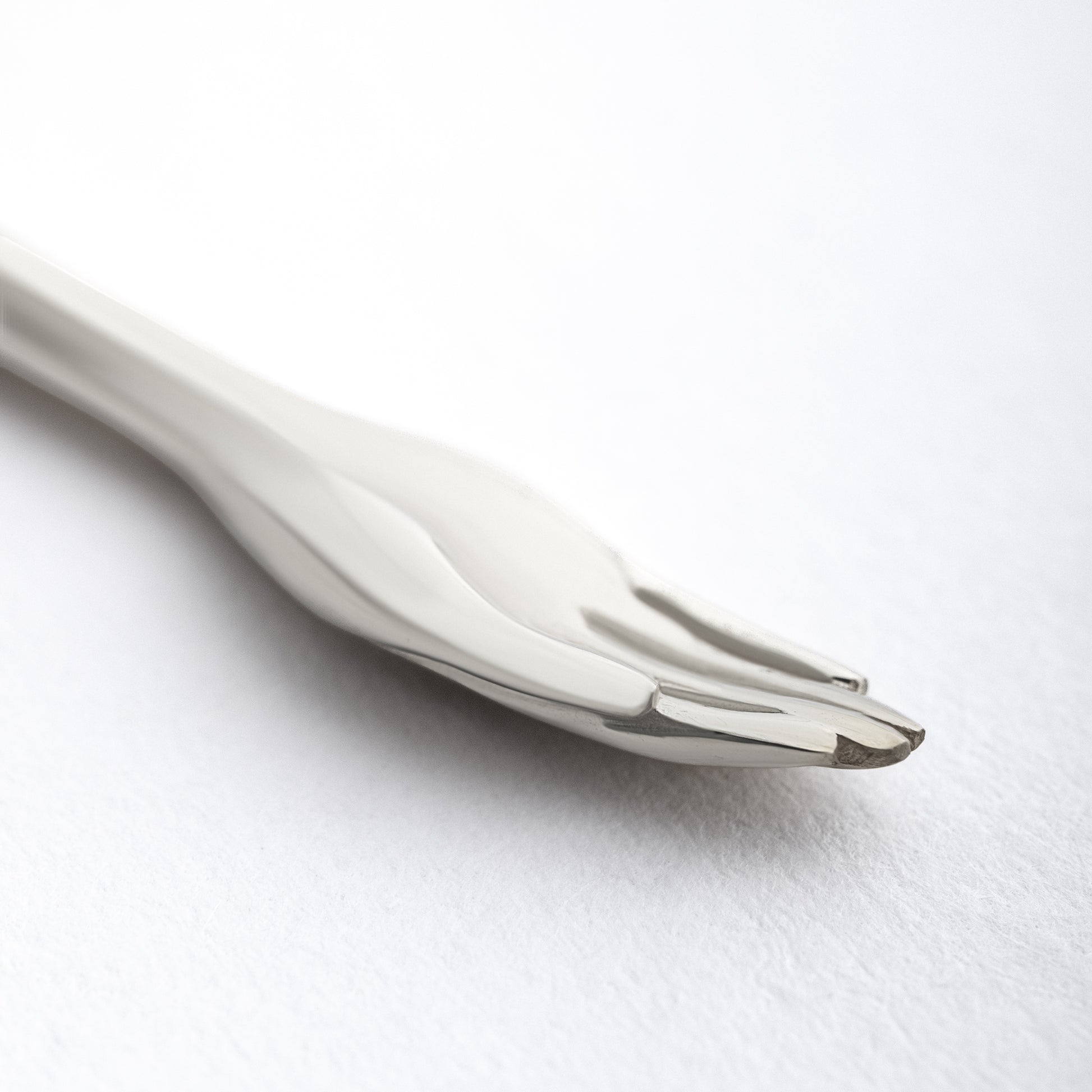 editorial shot of The Anglesea Arm Silver – silver stash spoon rave necklace